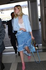 ELLE FANNING at Los Angeles International Airport 02/13/2016