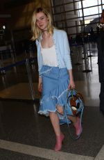 ELLE FANNING at Los Angeles International Airport 02/13/2016