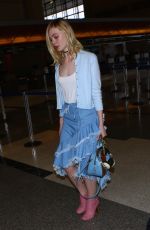 ELLE FANNING at Los Angeles International Airport 02/13/2016