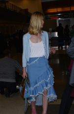 ELLE FANNING at Los Angeles International Airport 02/13/2016