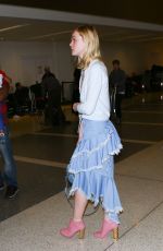 ELLE FANNING at Los Angeles International Airport 02/13/2016