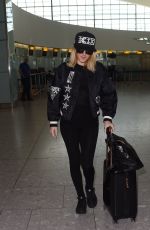 ELLIE GOULDING at Heathrow Airport in London 02/11/2016