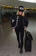 ELLIE GOULDING at Heathrow Airport in London 02/11/2016