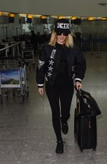 ELLIE GOULDING at Heathrow Airport in London 02/11/2016