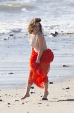 EMILIA CLARKE on the Set of a Photoshoot in Malibu 02/04/2016