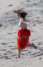 EMILIA CLARKE on the Set of a Photoshoot in Malibu 02/04/2016