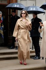 EMMY ROSSUM Leaves Carolina Herrera Fashion Show in New York 02/15/2016
