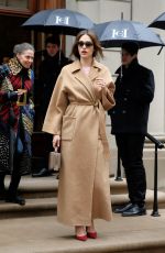 EMMY ROSSUM Leaves Carolina Herrera Fashion Show in New York 02/15/2016