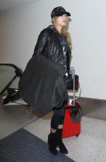 HAILEY BALDWIN at LAX Airport in Los Angeles 02/22/2016