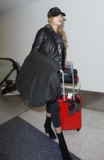 HAILEY BALDWIN at LAX Airport in Los Angeles 02/22/2016