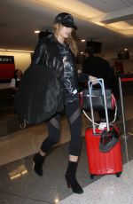 HAILEY BALDWIN at LAX Airport in Los Angeles 02/22/2016