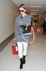 HAILEY BALDWIN at Los Angeles International Airport 02/19/2016