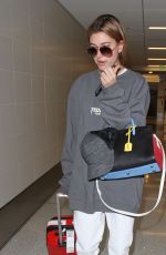 HAILEY BALDWIN at Los Angeles International Airport 02/19/2016
