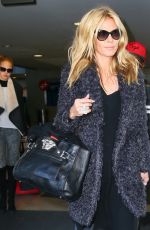 HEIDI KLUM at Los Angeles International Airport 02/11/2016