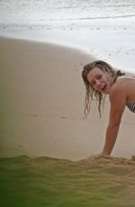 HILARY DUFF in Bikini at a Neach in Maui 02/10/2016