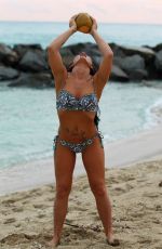 JANELLE EVANS in Bikini at a Beach in Miami 02/09/2016