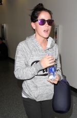 JENELLE EVANS at LAX Airport in Los Angeles 02/22/2016