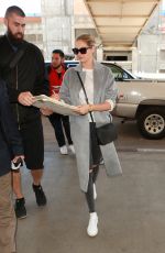 KATE UPTON Arrives at LAX Airport in Los Angeles 02/03/2016