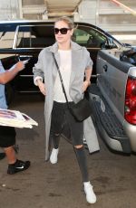KATE UPTON Arrives at LAX Airport in Los Angeles 02/03/2016