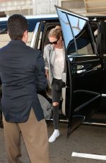 KATE UPTON Arrives at LAX Airport in Los Angeles 02/03/2016