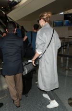 KATE UPTON Arrives at LAX Airport in Los Angeles 02/03/2016