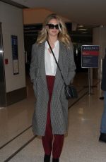 KATE UPTON at LAX Airport in Los Angeles 02/01/2016