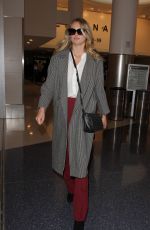 KATE UPTON at LAX Airport in Los Angeles 02/01/2016