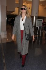 KATE UPTON at LAX Airport in Los Angeles 02/01/2016