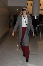 KATE UPTON at LAX Airport in Los Angeles 02/01/2016