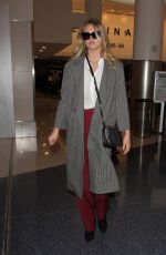 KATE UPTON at LAX Airport in Los Angeles 02/01/2016