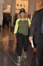 KIM BURRELL at LAX Airport in Los Angeles 02/08/2016