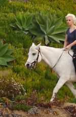 LADY GAGA Riding a Horse Out in Malibu 01/28/2016