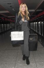 LAURA WHITMORE at Heathrow Airport in London 02/13/2016