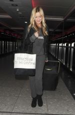LAURA WHITMORE at Heathrow Airport in London 02/13/2016