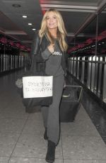 LAURA WHITMORE at Heathrow Airport in London 02/13/2016