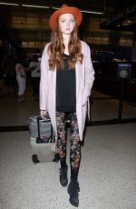 LILY COLE at Los Angeles International Airport 02/26/2016