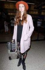 LILY COLE at Los Angeles International Airport 02/26/2016