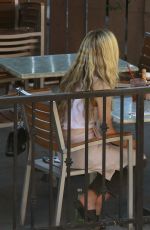 LILY COLLINS in Leggings and Tank Top Luch at Hugo
