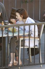 LILY COLLINS in Leggings and Tank Top Luch at Hugo