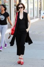 LILY COLLINS Leaves Cryohealthcare in Los Angeles 02/21/2016