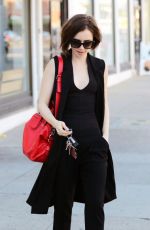 LILY COLLINS Leaves Cryohealthcare in Los Angeles 02/21/2016