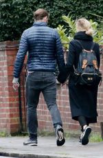 MARGOT ROBBIE Out and About in London 02/04/2016