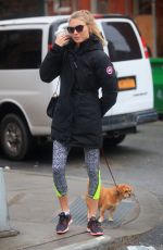 MARTHA HUNT Walks Her Dog Out in New York 02/03/2016