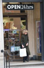 MEG RYAN Leaves Duane Reade Pharmacy and Store in Soho 02/04/2016