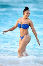 MELANIE BROWN in Bikini at a Beach in Turks & Caicos 02/08/2016
