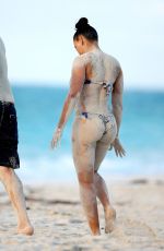 MELANIE BROWN in Bikini at a Beach in Turks & Caicos 02/08/2016