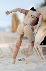 MELANIE BROWN in Bikini at a Beach in Turks & Caicos 02/08/2016