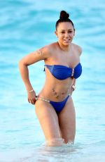 MELANIE BROWN in Bikini at a Beach in Turks & Caicos 02/08/2016