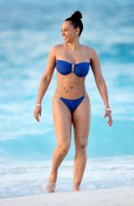 MELANIE BROWN in Bikini at a Beach in Turks & Caicos 02/08/2016