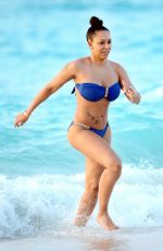 MELANIE BROWN in Bikini at a Beach in Turks & Caicos 02/08/2016